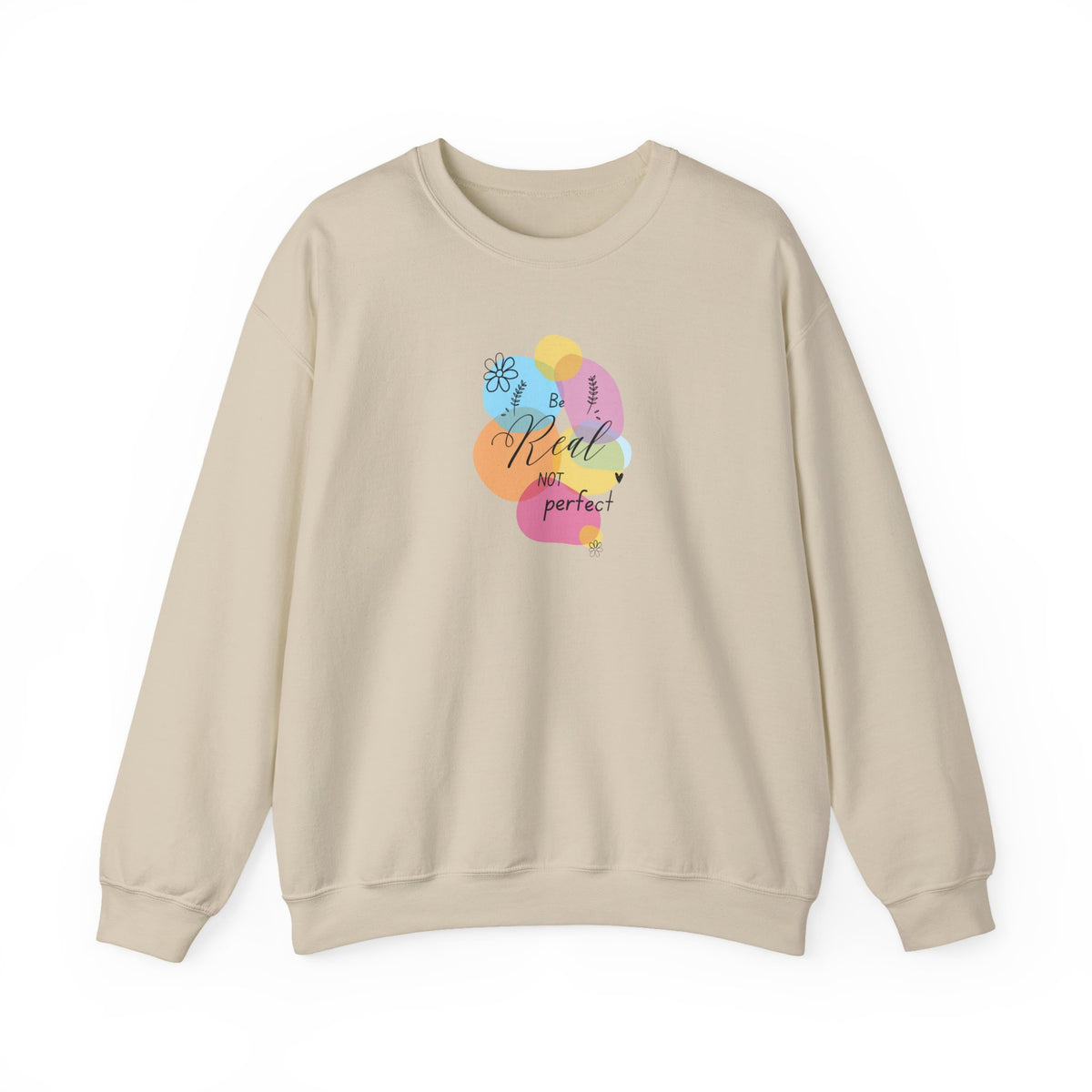 A beige crewneck sweatshirt with a colorful graphic on the chest featuring pastel shapes and the text 'Real not perfect!'.
