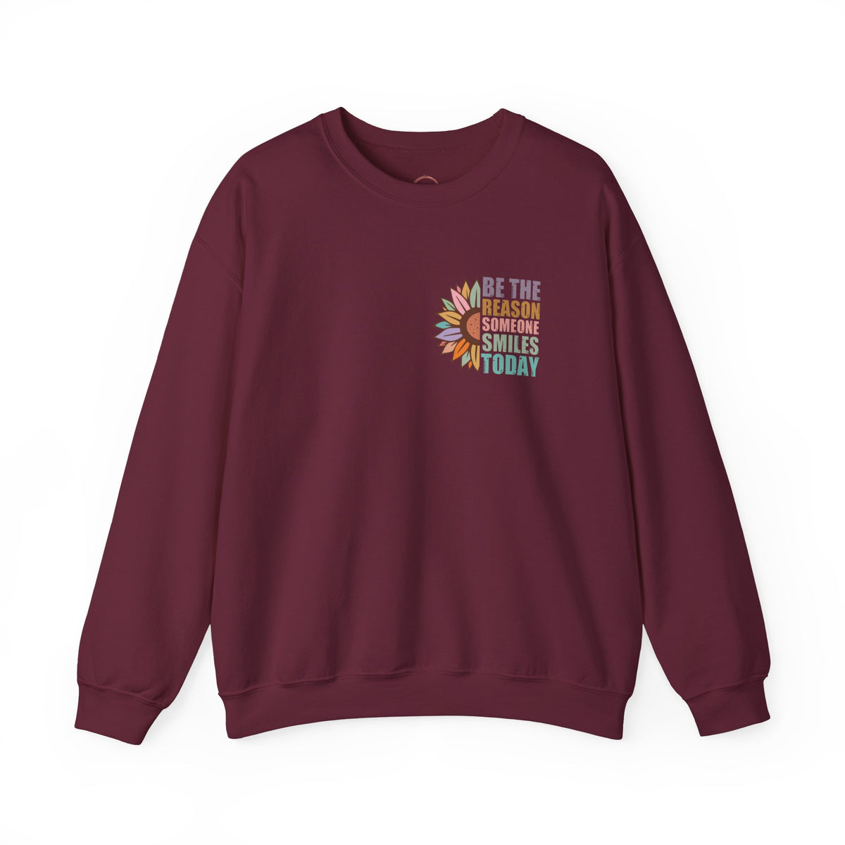 A maroon crewneck sweatshirt with a small white graphic on the left chest featuring the text 'SCYTHBATTLOGE' and a horned figure, displayed on a clean white background.